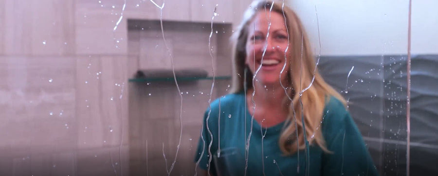 Water beading off EnduroShield-treated shower glass — what 30 seconds gets you